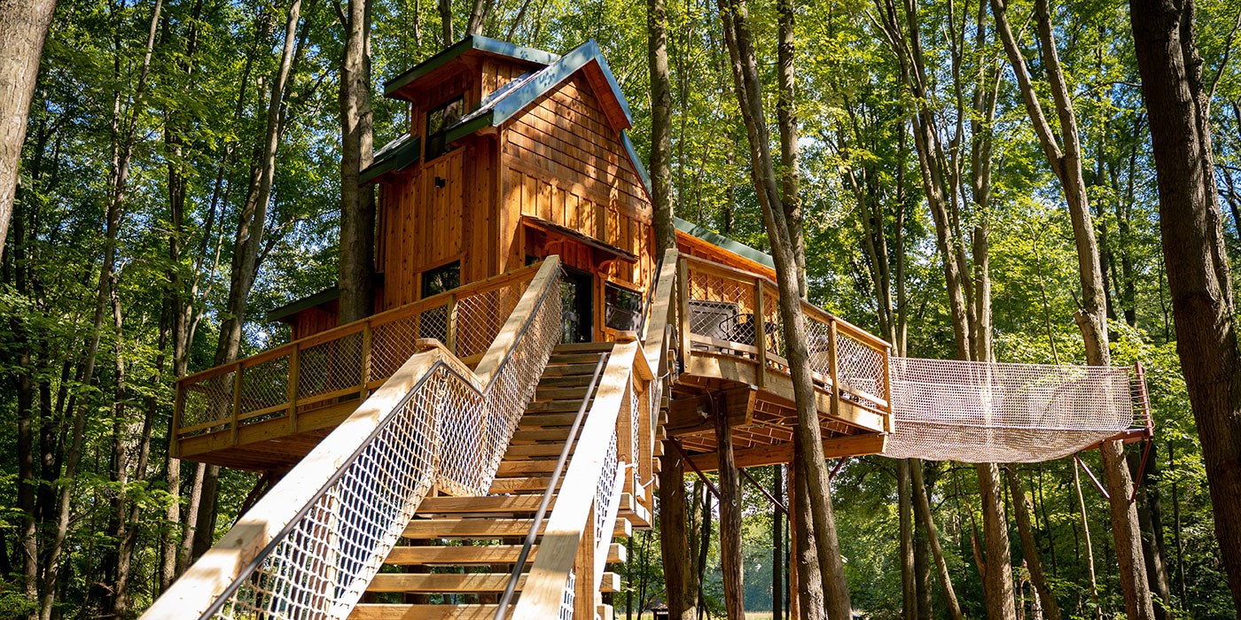 Select https://metroparkstoledo.com/features-and-rentals/treehouse-village-the-dragline/