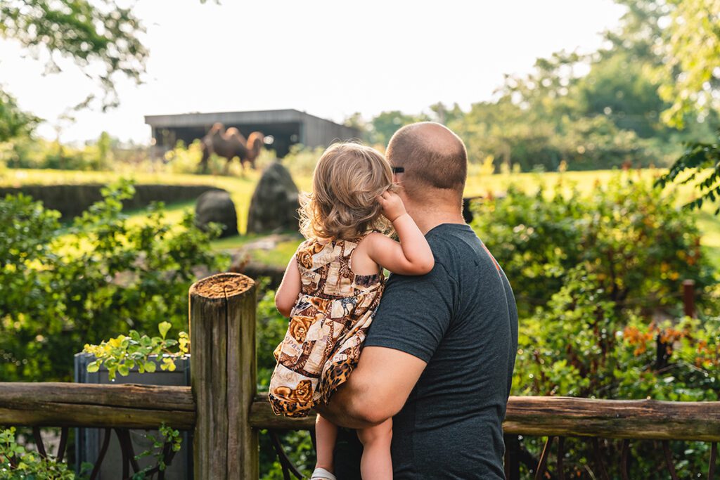 Father and daughter at the zoo